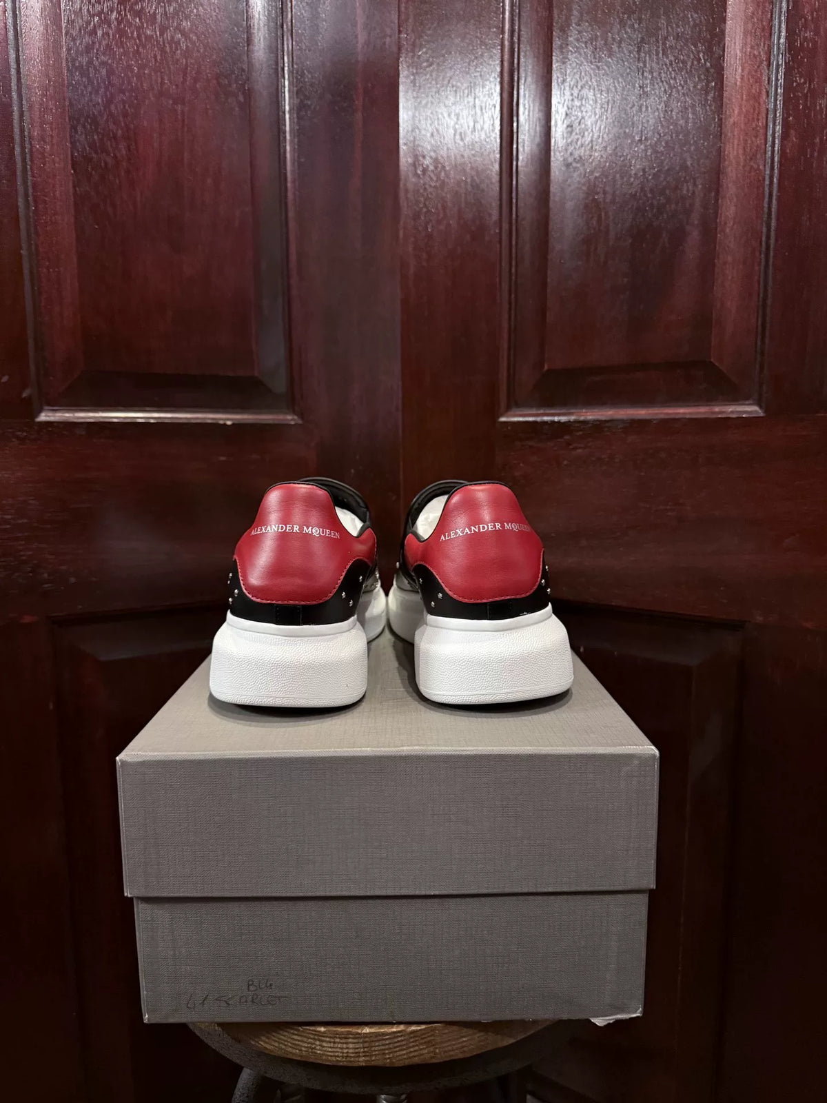 Alexander McQueen Black Five-Pointed Star Studded Skull Red Heel Chunky Sole Slip-On Sneakers