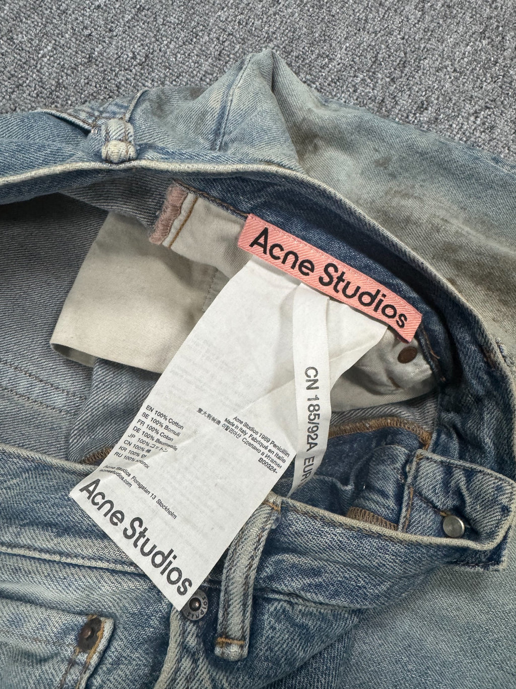 Acne Studios Mud-Dyed Ripped Denim Trousers