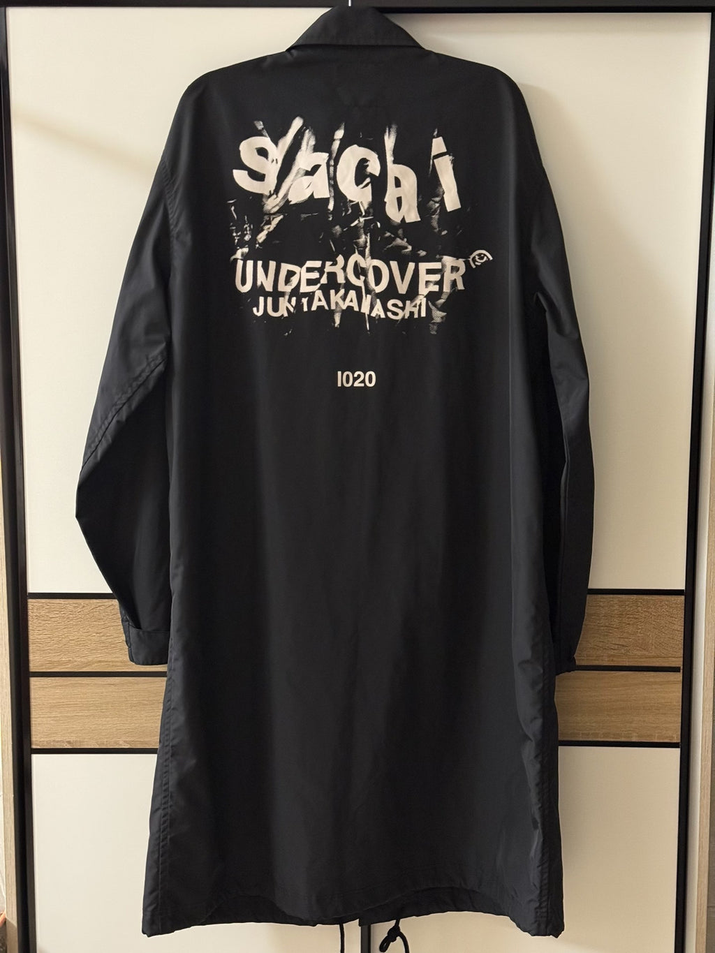 Sacai and Undercover collaboration runway coat