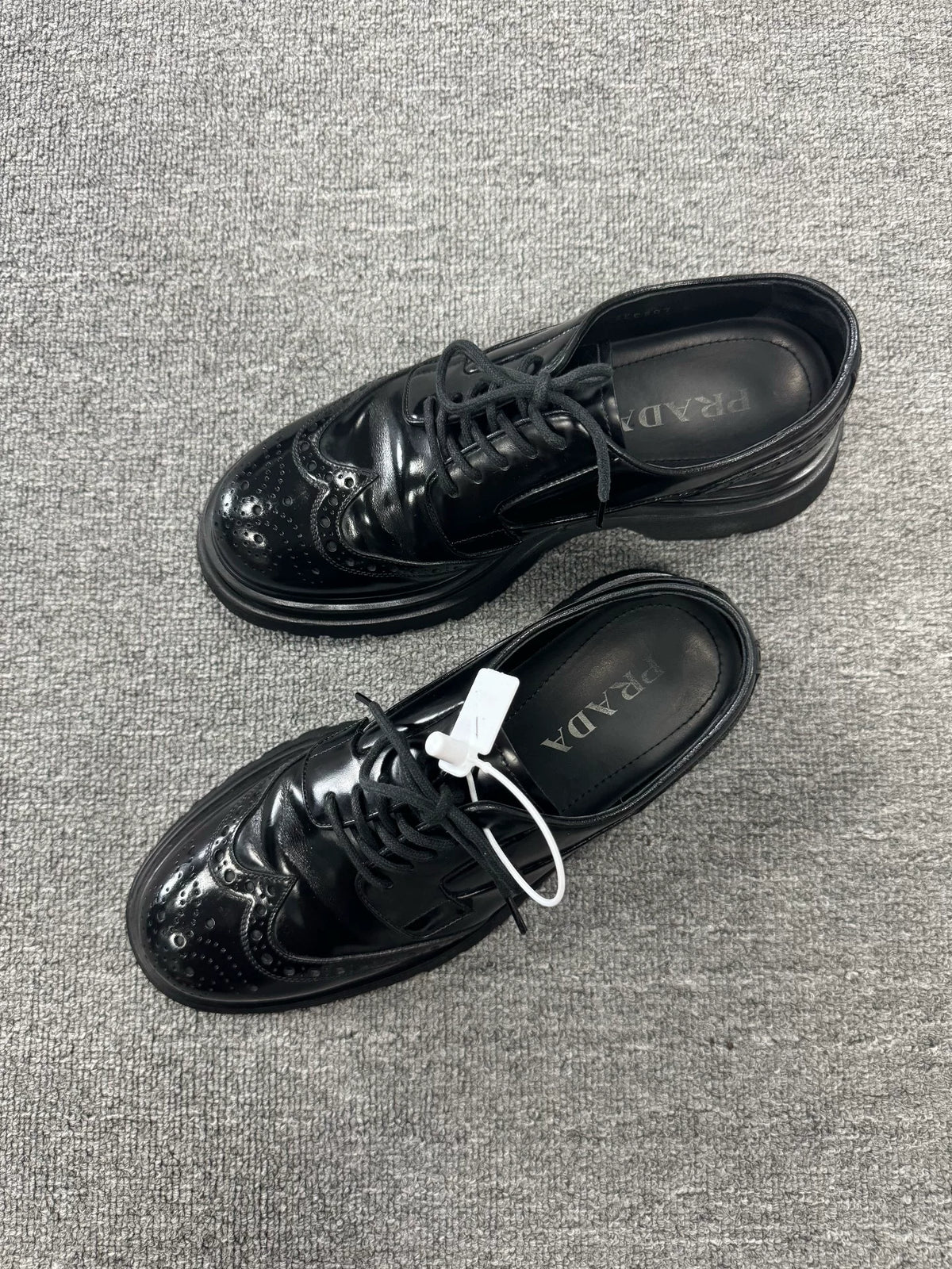 Prada Embossed Platform Leather Loafers