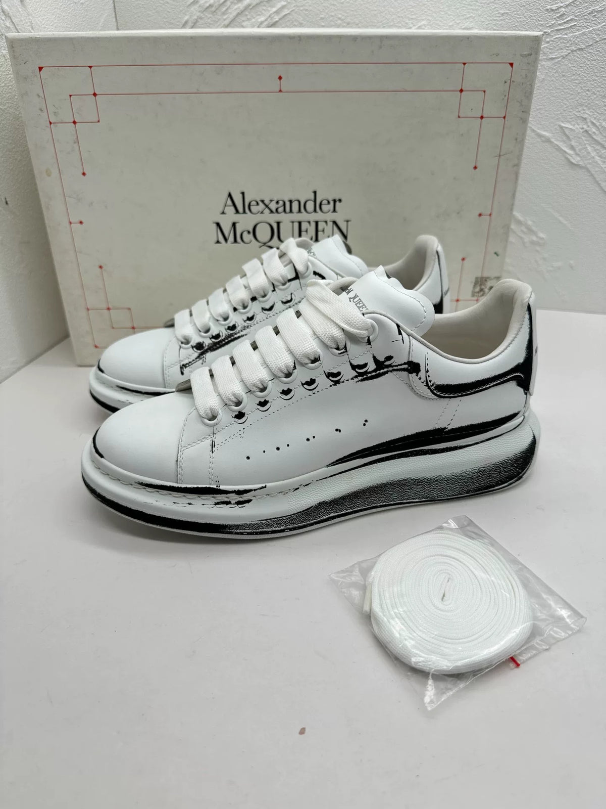 Alexander McQueen Graffiti Print White Black Chunky Low-Top Sneakers