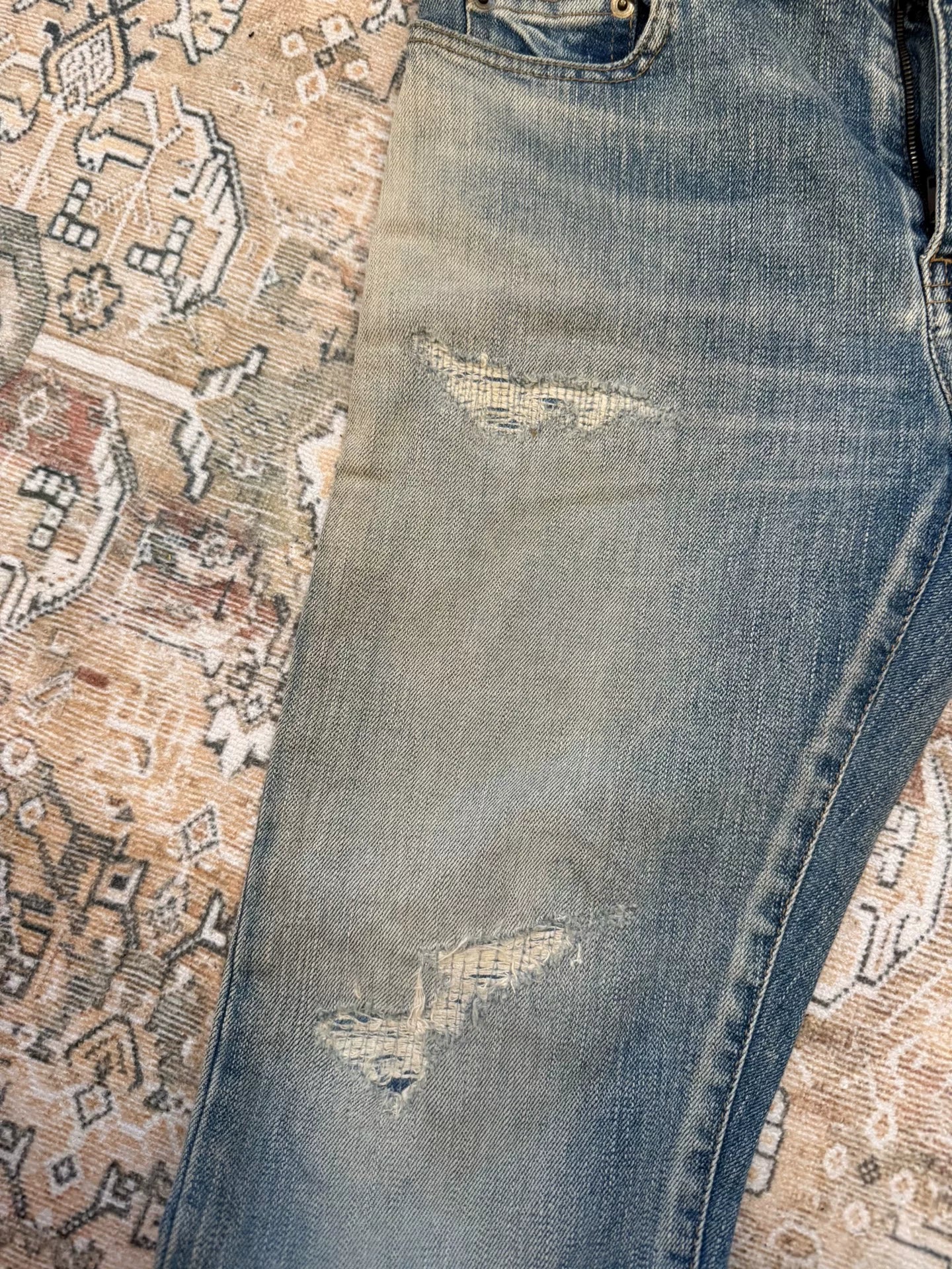 Saint Laurent Hedi era d02 heavily distressed patchwork jeans