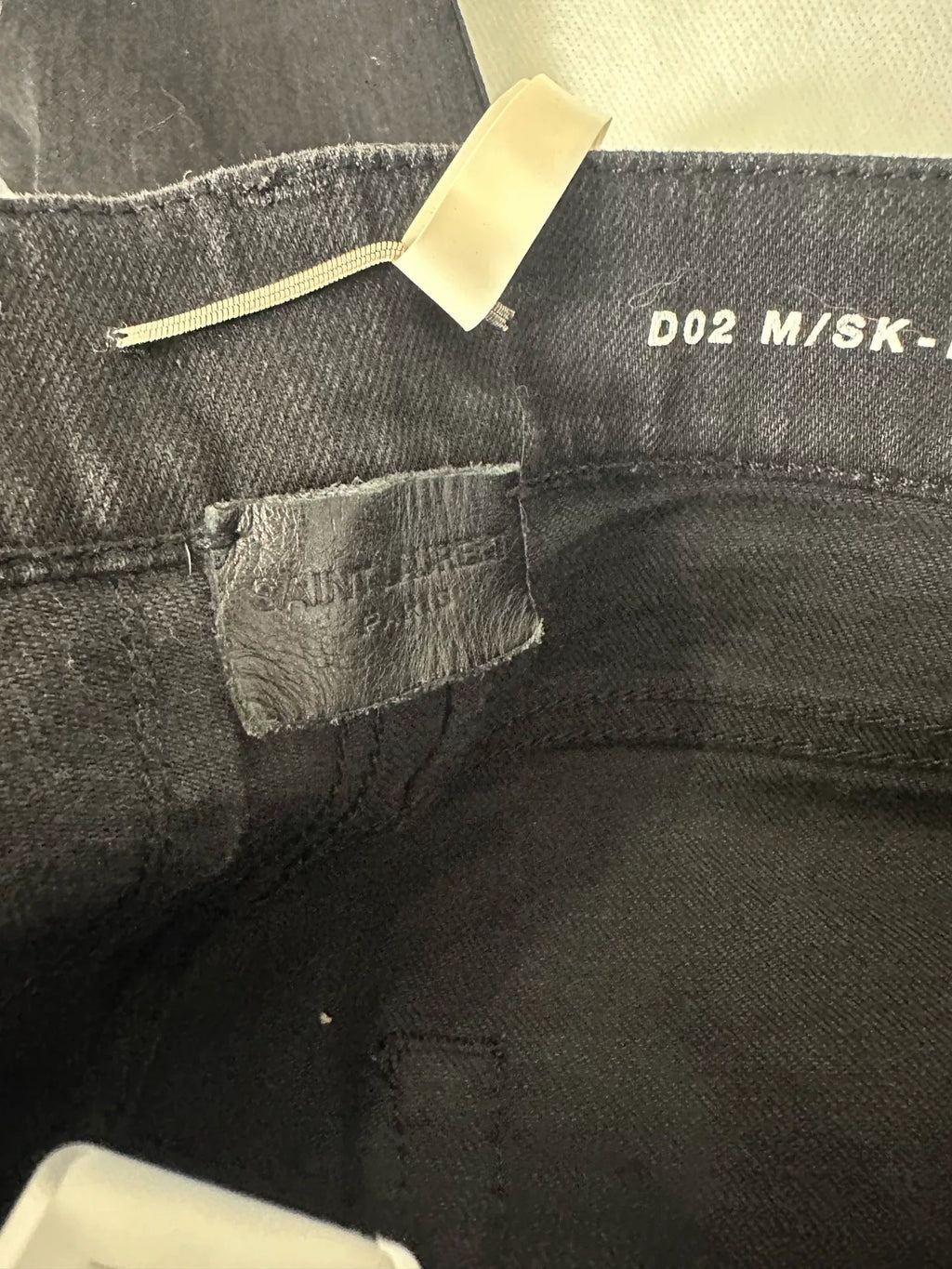 Saint Laurent Black Five-Zip Patchwork Denim Jeans by Hedi Slimane
