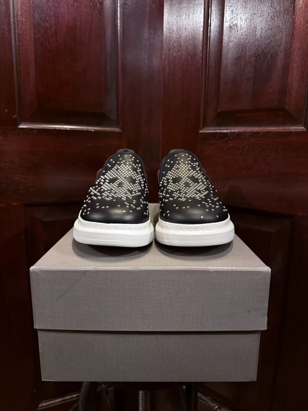 Alexander McQueen Black Five-Pointed Star Studded Skull Red Heel Chunky Sole Slip-On Sneakers