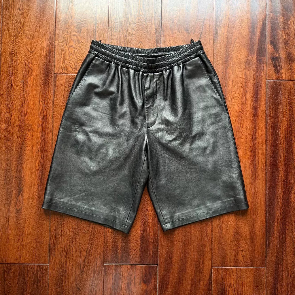 Prada triangular steel logo leather shorts