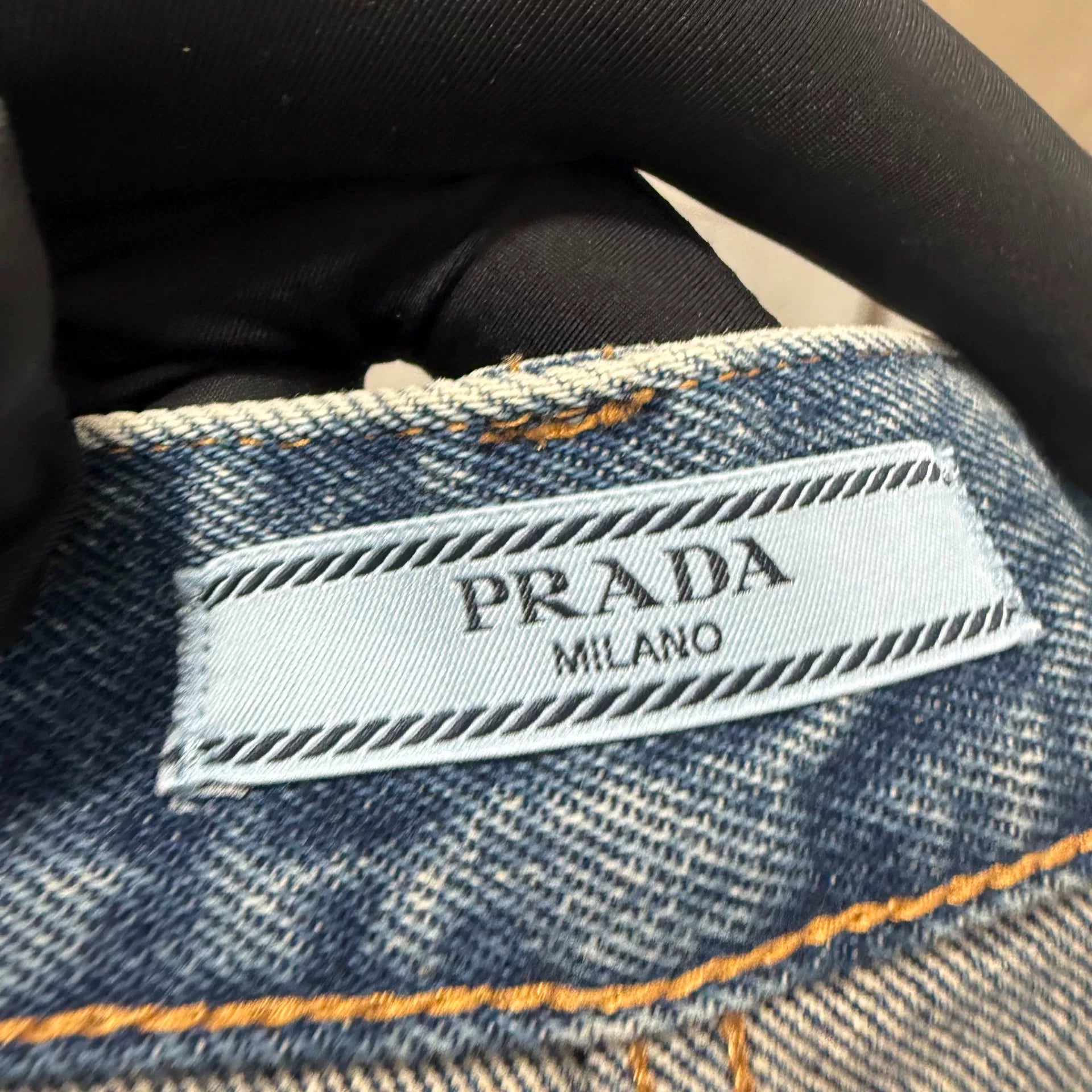 Prada Triangle Logo Distressed Denim Shorts