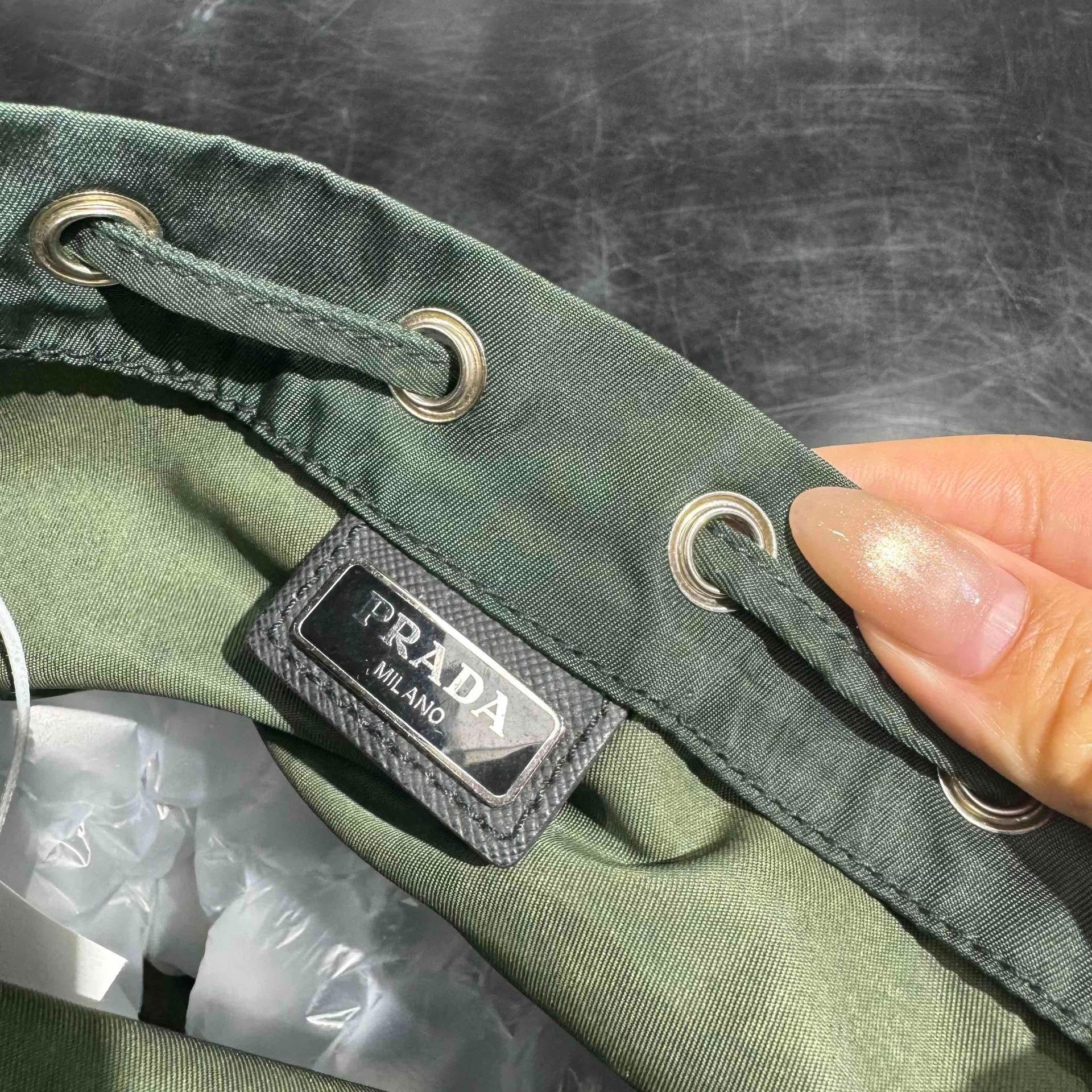 Prada Triangle Logo Drawstring Backpack