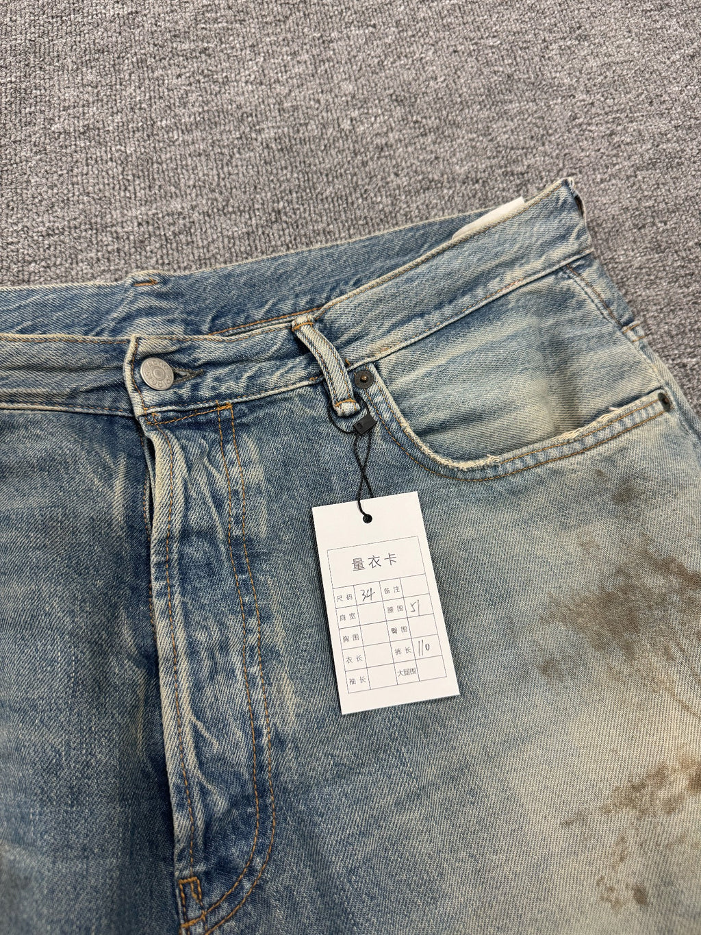 Acne Studios Mud-Dyed Ripped Denim Trousers