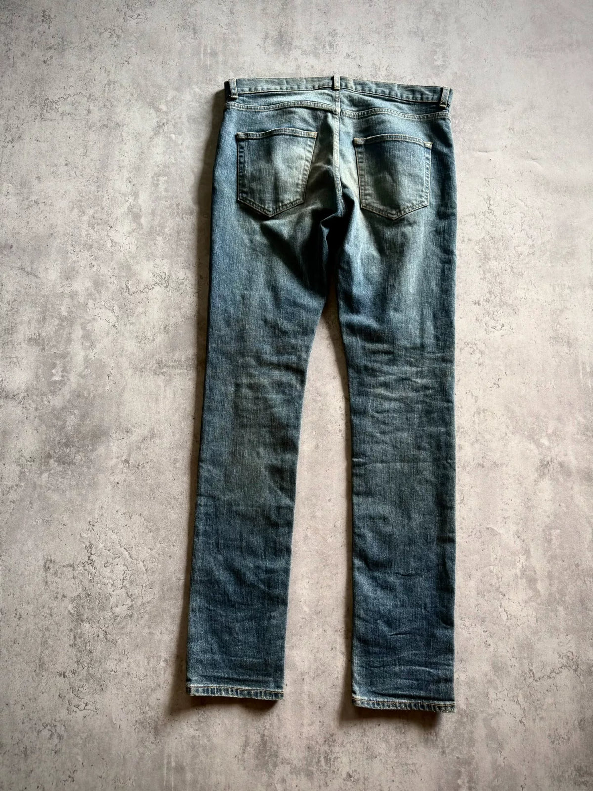 Saint Laurent 17AW Blue Washed Mud-Dyed Single-Knee Knife-Cut Jeans by Anthony Vaccarello
