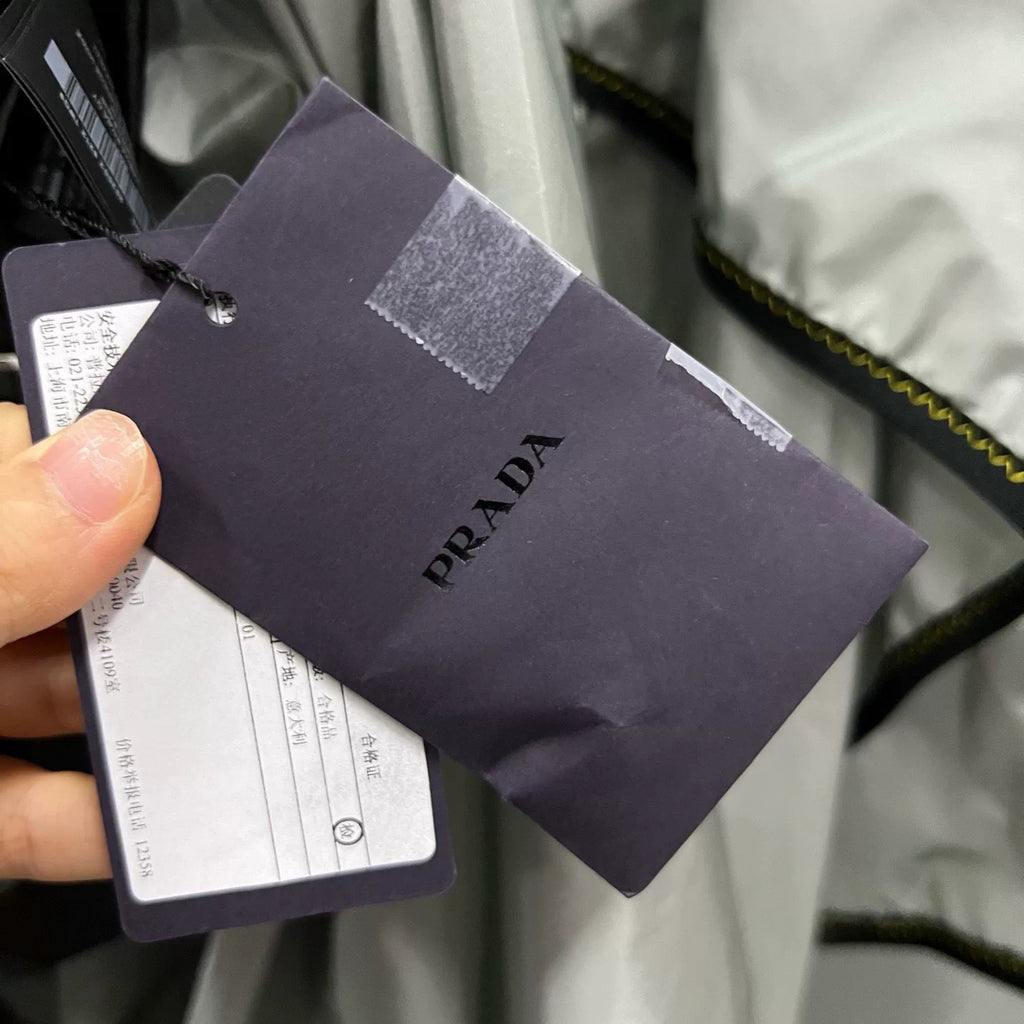 Prada Silver Hooded Triangle Logo Cape