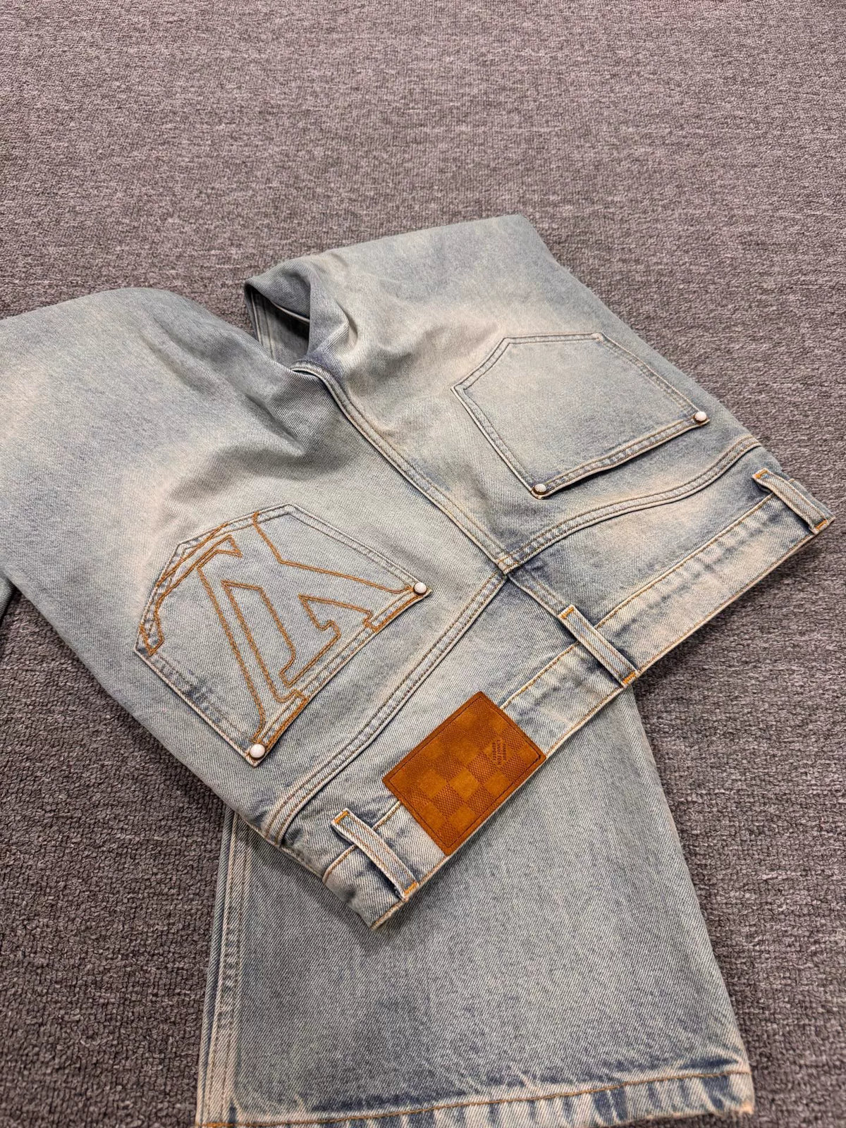Louis Vuitton SS25 Embroidered Logo Denim Flared Trousers