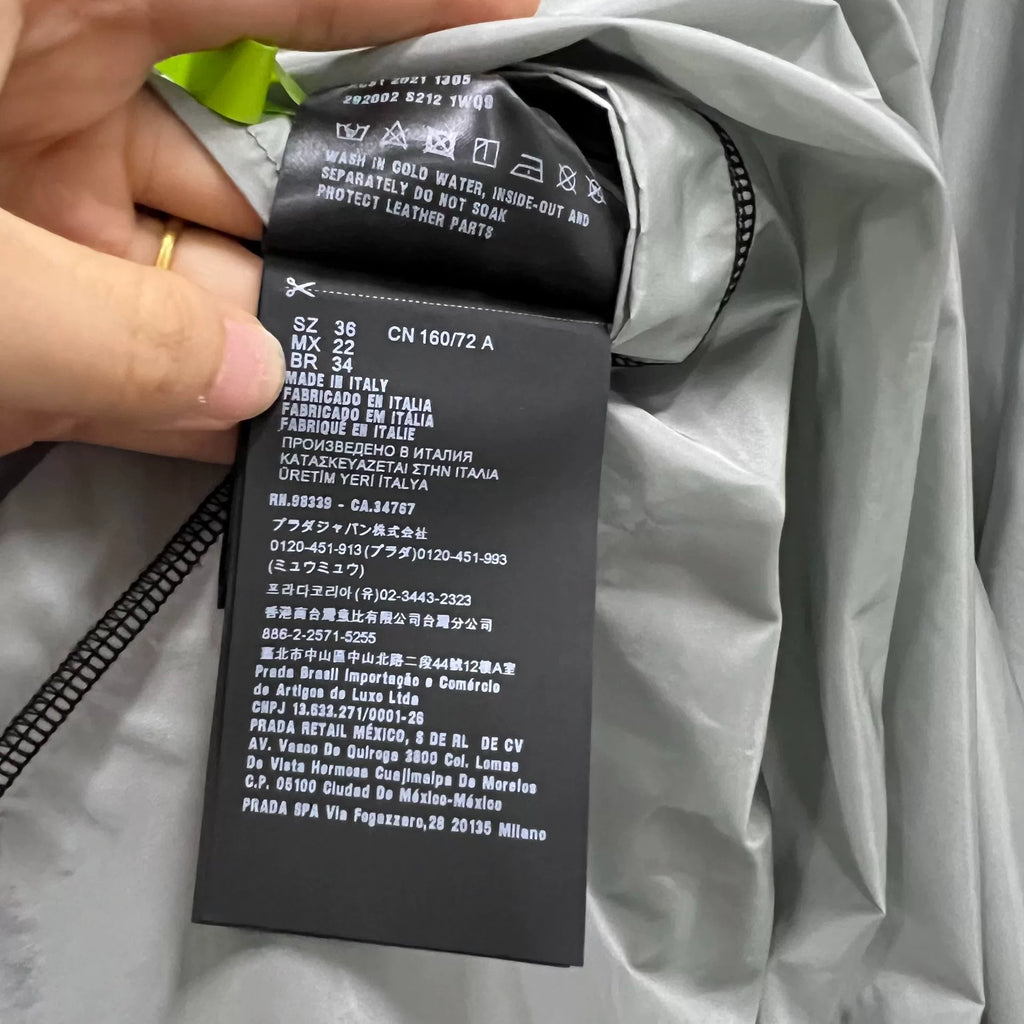 Prada Silver Hooded Triangle Logo Cape
