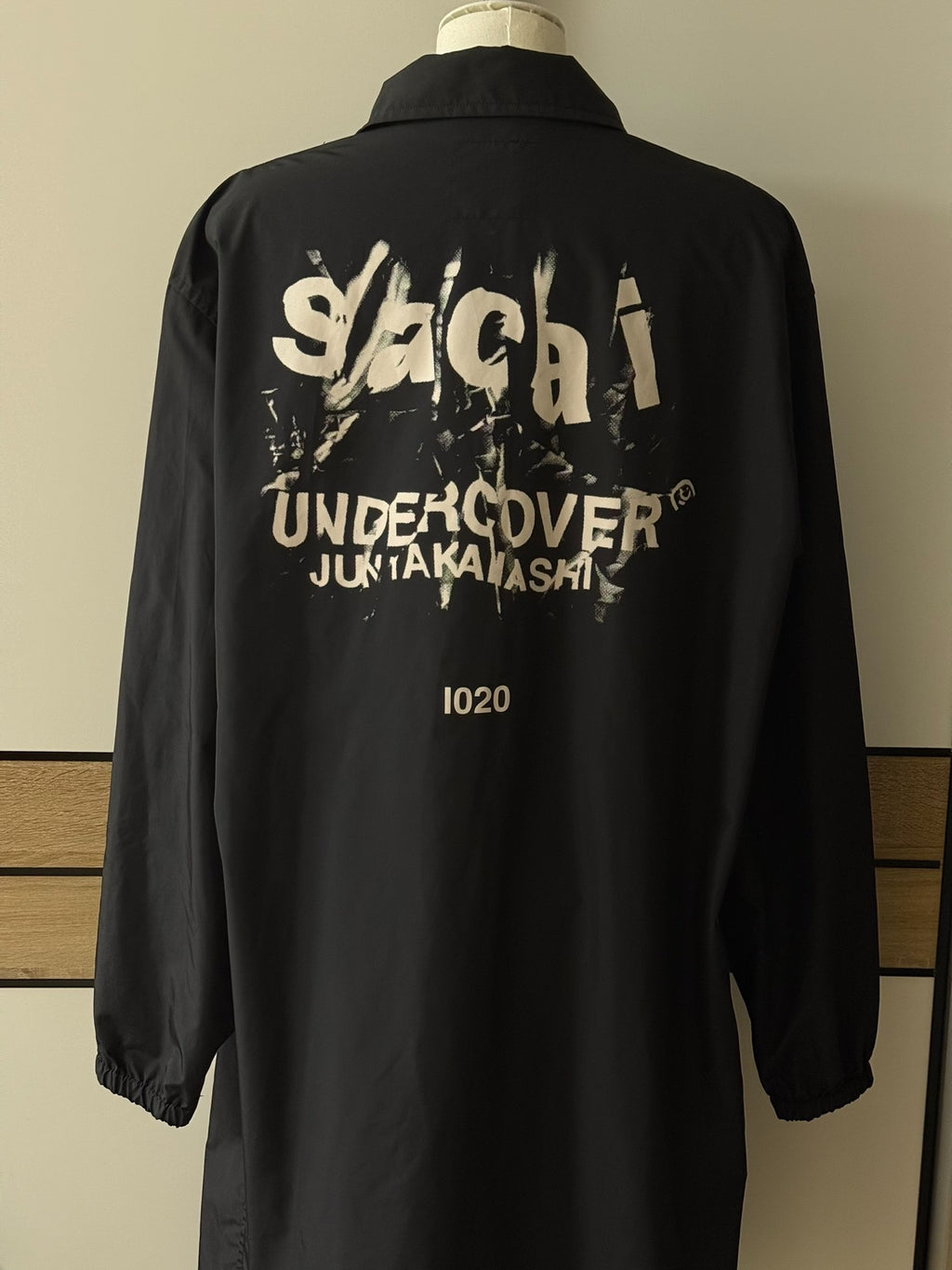 Sacai and Undercover collaboration runway coat