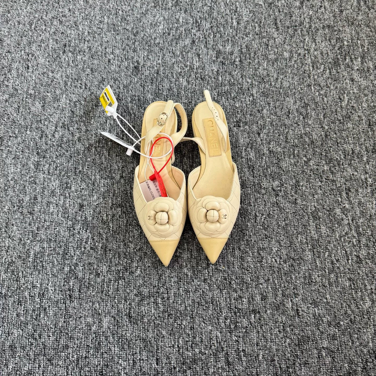 Chanel beige camellia pointed-toe shoes