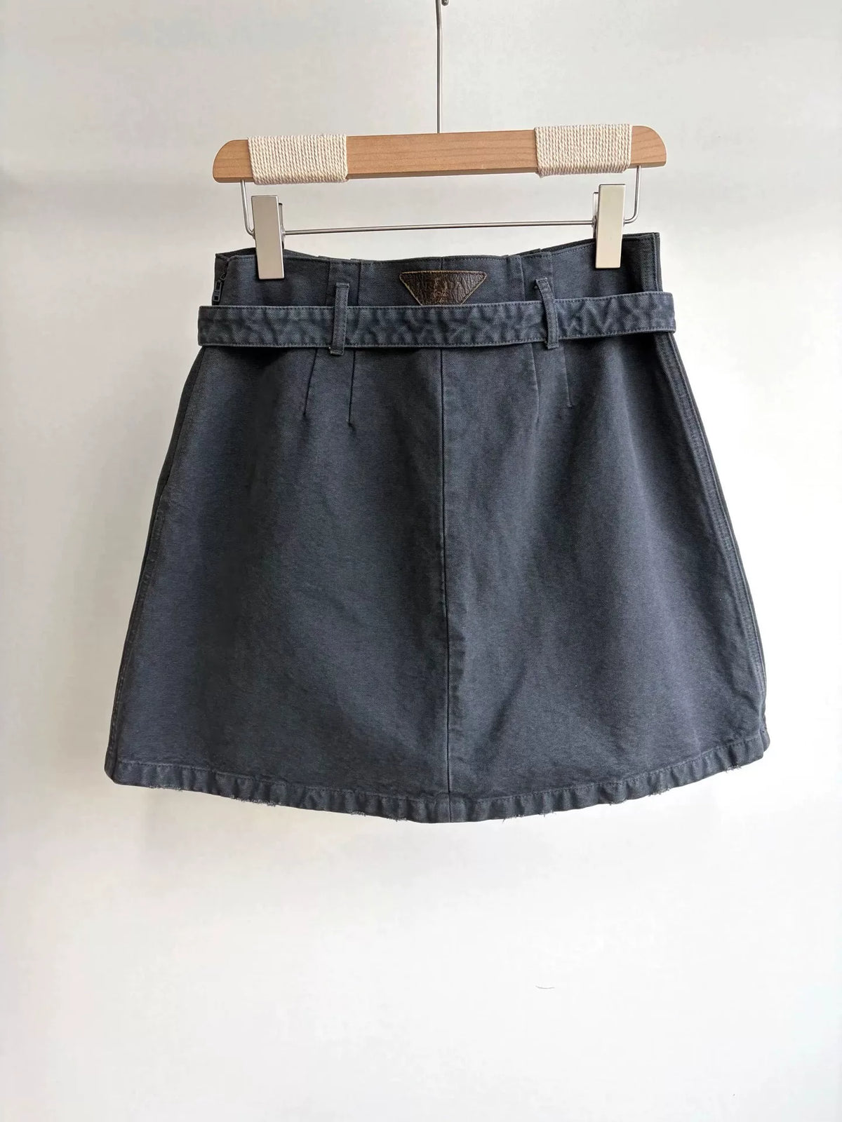 Prada Distressed Triangle Logo Denim Skirt