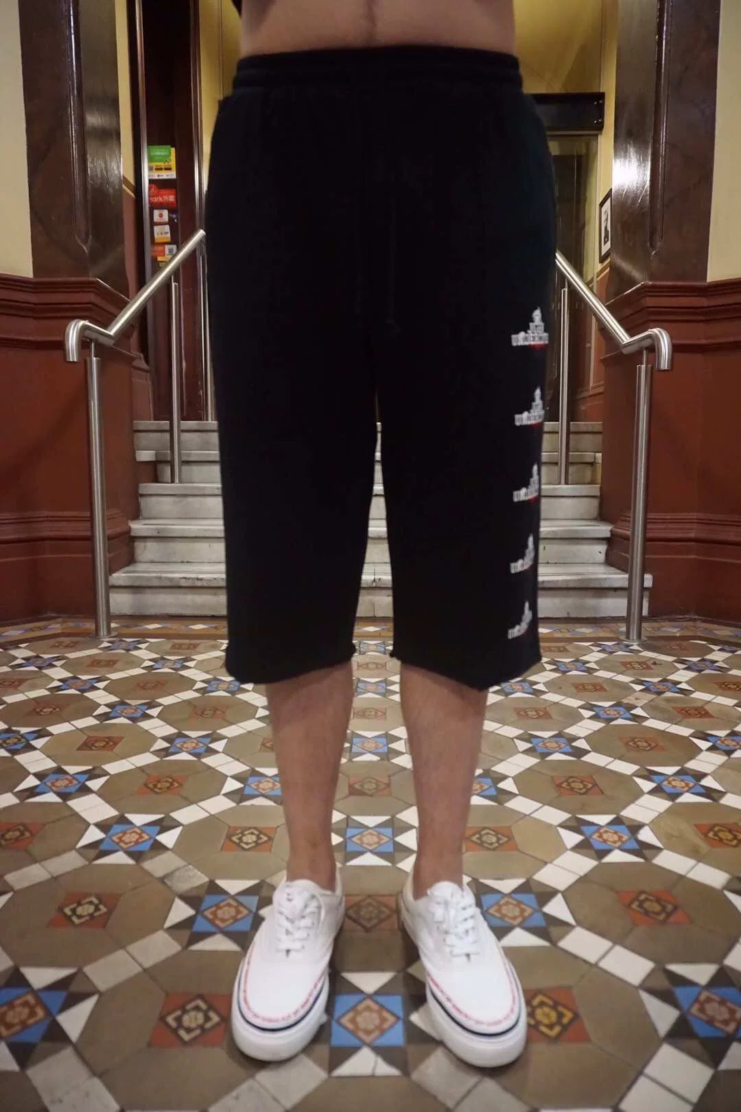 Johnundercover SS19 Black Logo Print Cotton Shorts