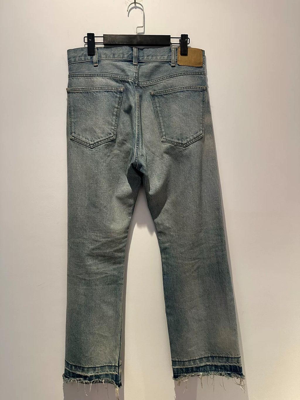 Celine Wesley ice blue knife-cut distressed vintage jeans