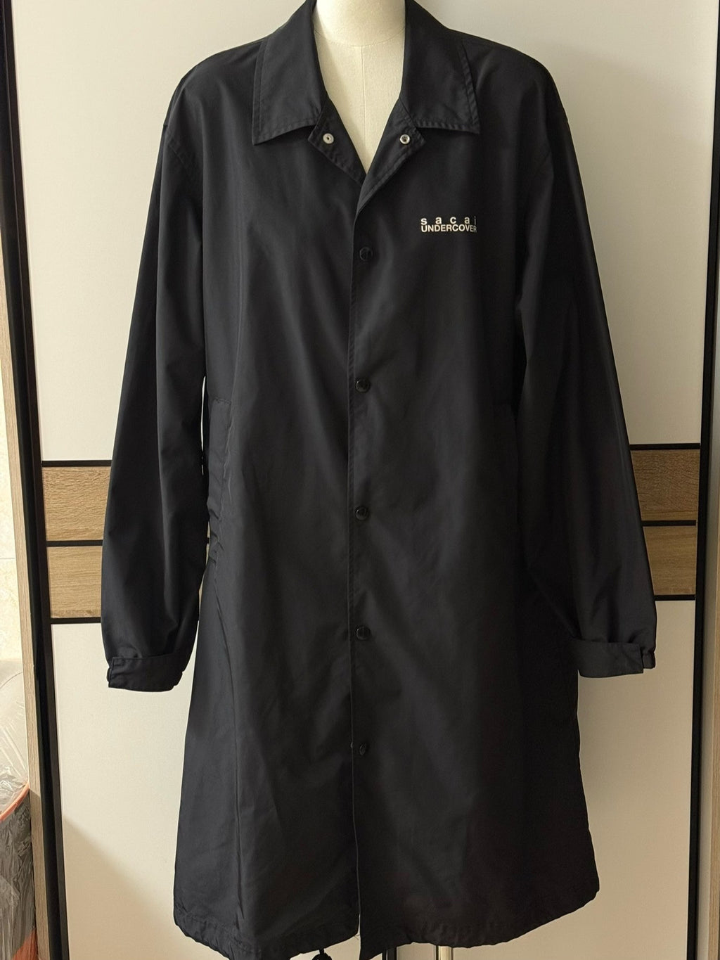 Sacai and Undercover collaboration runway coat