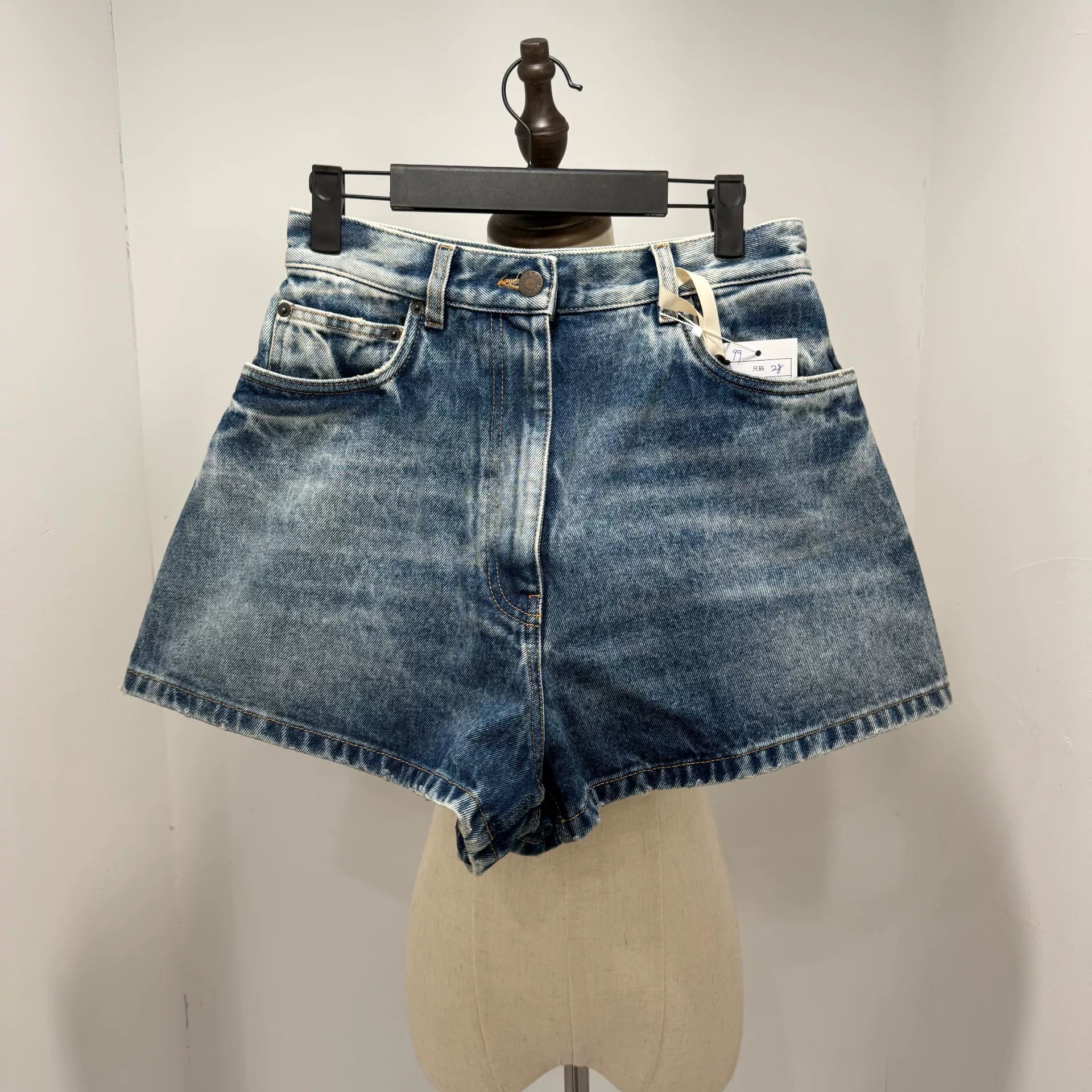 Prada Triangle Logo Distressed Denim Shorts
