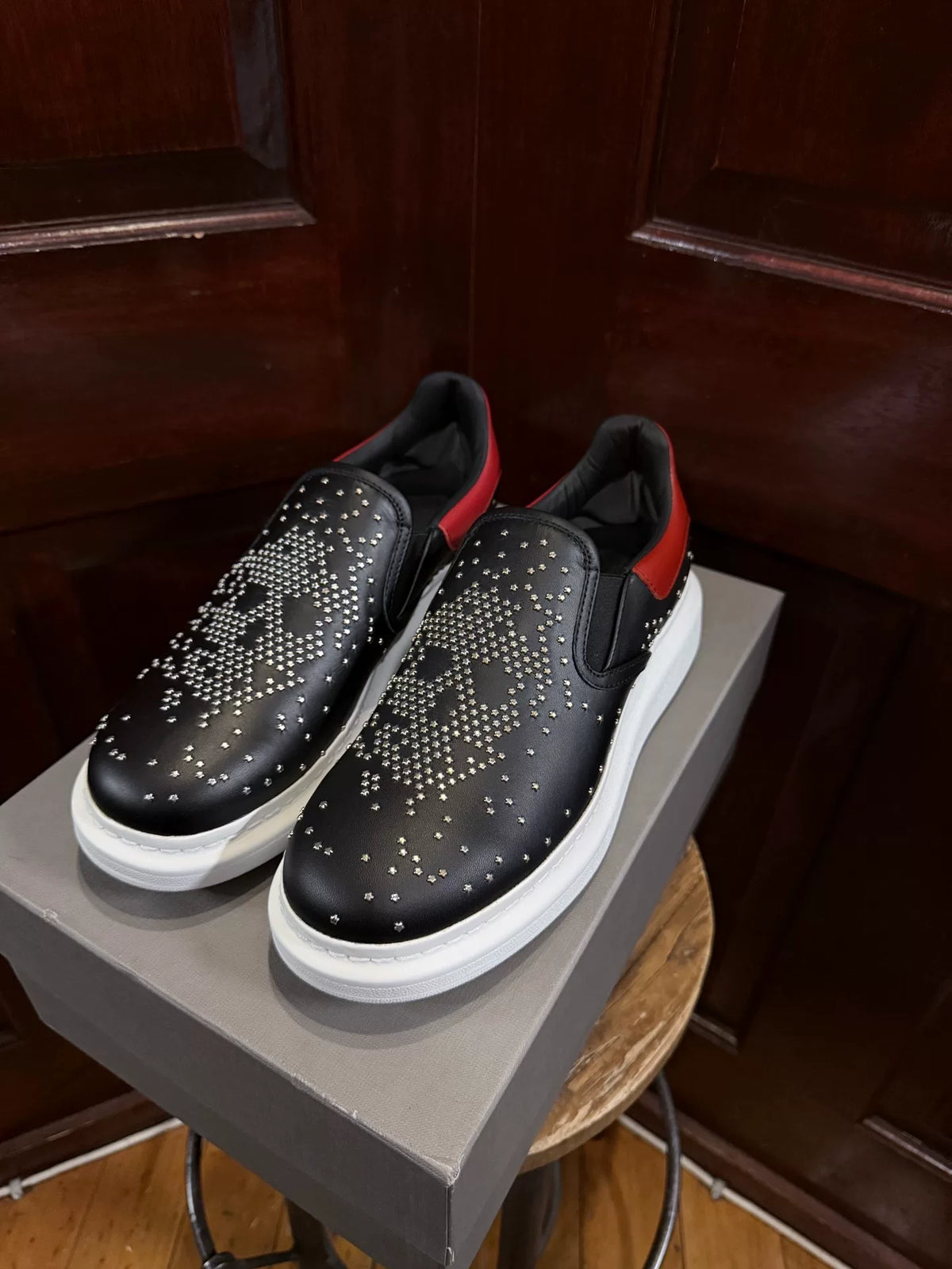 Alexander McQueen Black Five-Pointed Star Studded Skull Red Heel Chunky Sole Slip-On Sneakers
