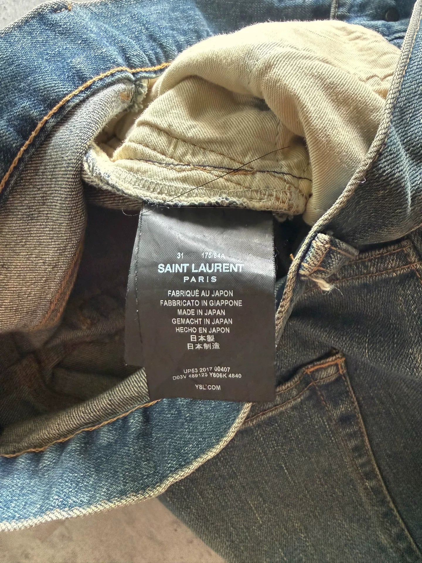 Saint Laurent 17AW Blue Washed Mud-Dyed Single-Knee Knife-Cut Jeans by Anthony Vaccarello