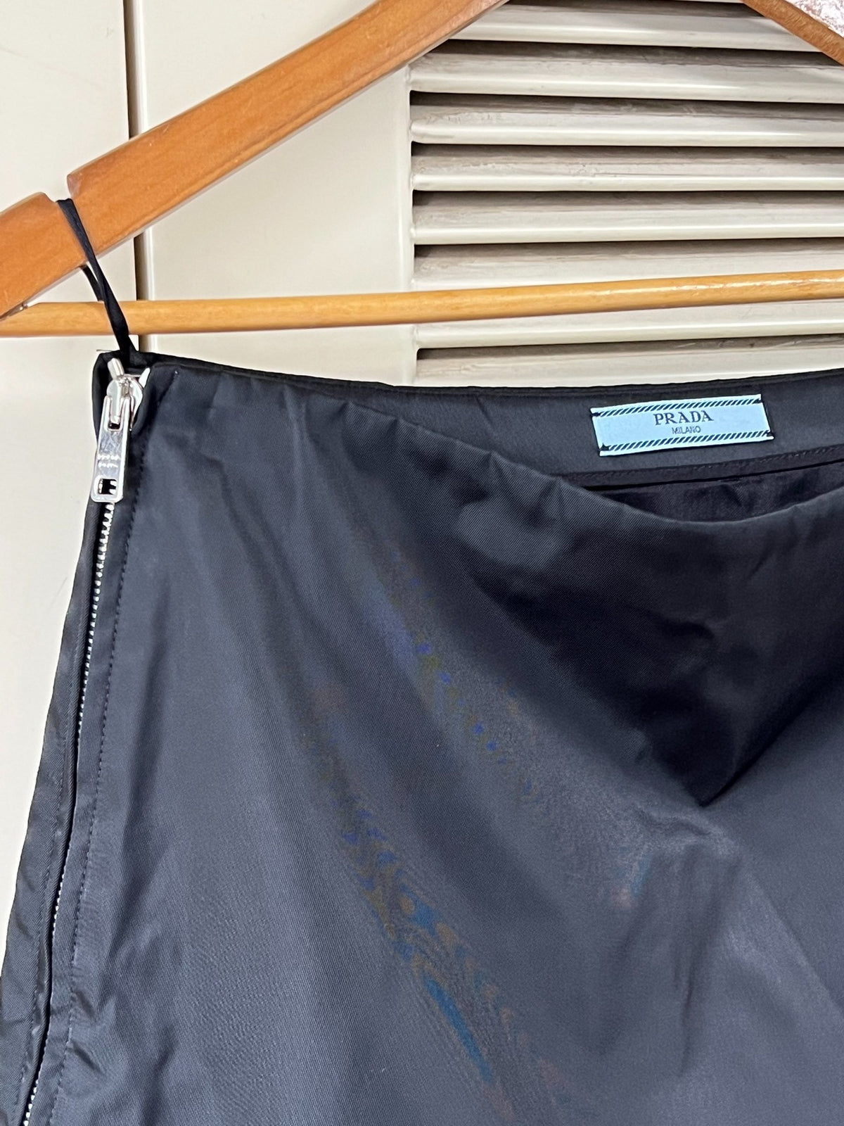 Prada black triangular logo studded skirt