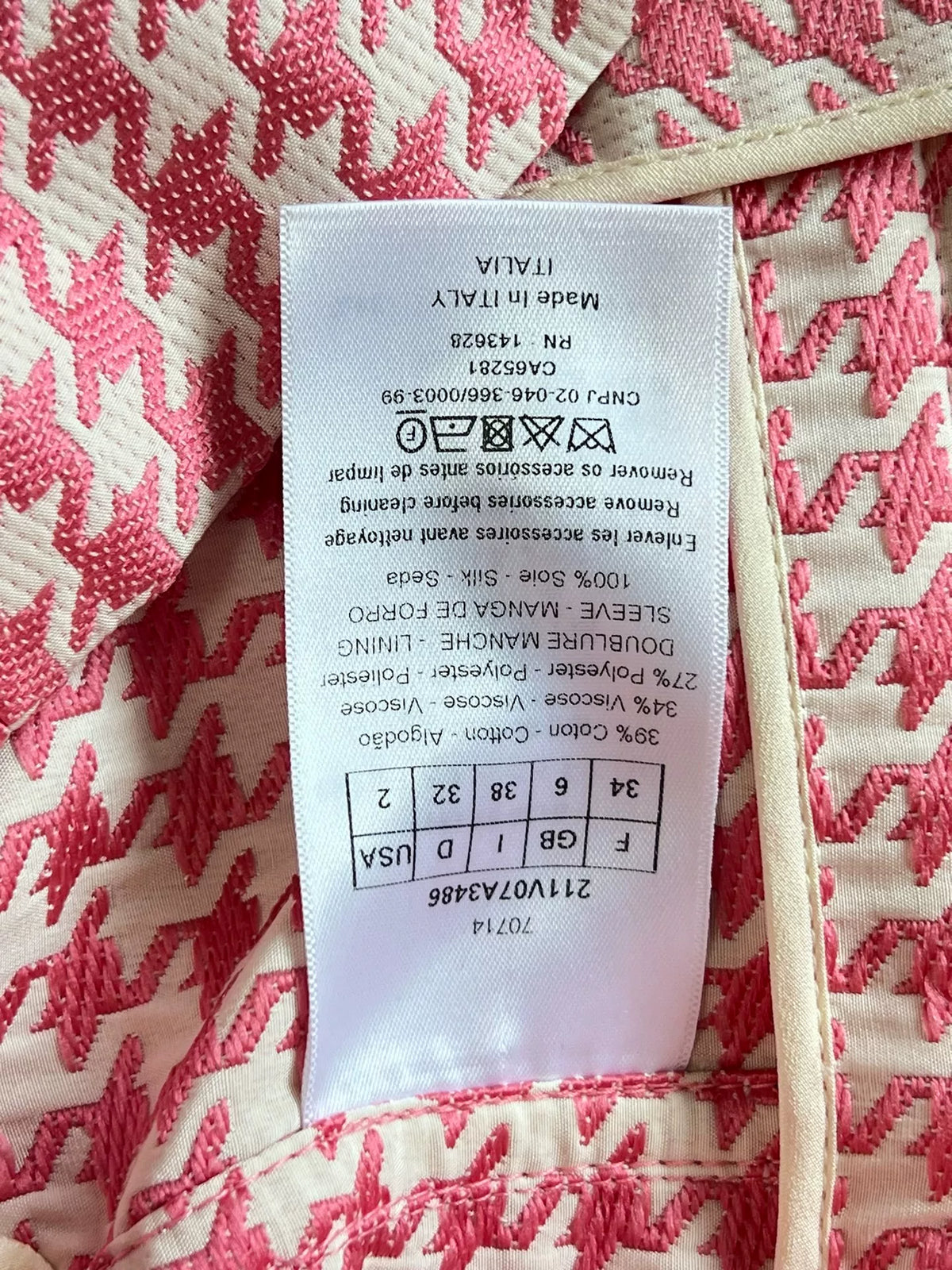 Dior pink houndstooth coat