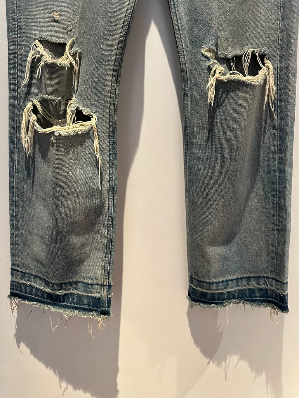 Celine Wesley ice blue knife-cut distressed vintage jeans