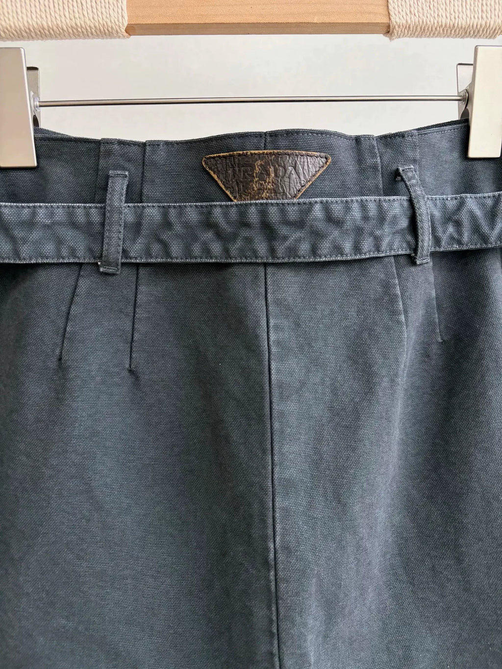 Prada Distressed Triangle Logo Denim Skirt