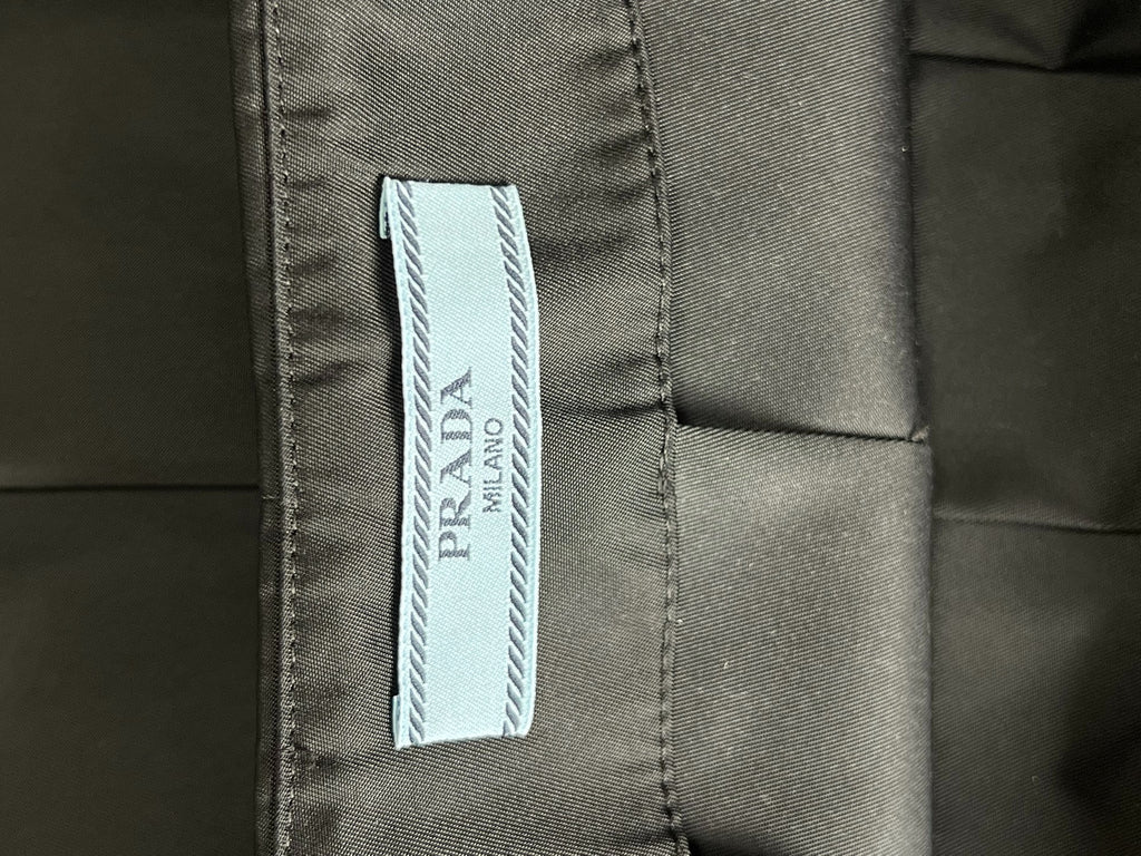 Prada Re-Nylon Recycled Nylon Belted Triangle Logo Skirt
