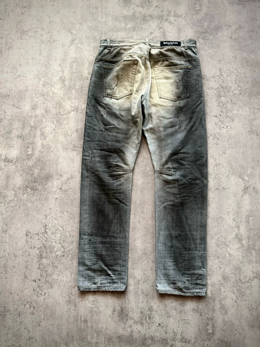 Balmain Paris 11SS Ice Blue Wash Ghost‑claw Oil‑stain Splatter Curved Denim Pants by Christophe Decarnin